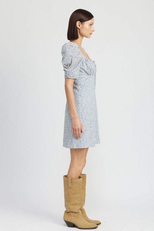 Emory Park Floral Mini Dress With Puff Sleeves in blue floral print worn with tan boots