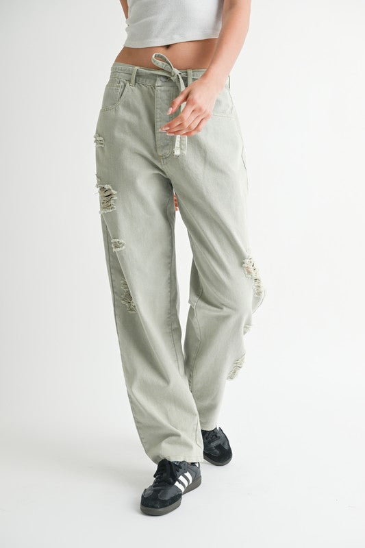 Emory Park distressed wide leg pants in light gray with ripped details and drawstring waist