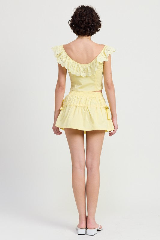 Emory Park Square Neck Ruffle Corset Top in yellow with lace detailing on back worn by model