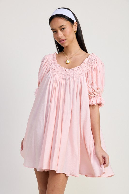 Emory Park Mini Embroidery Short Puff Sleeve Dress in light pink worn by model with white headband