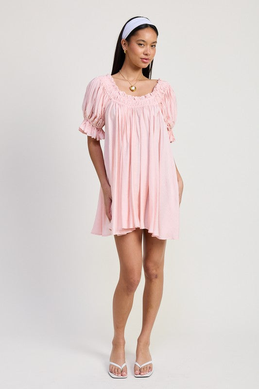 Emory Park Mini Embroidery Short Puff Sleeve Dress in pink worn with headband and white sandals