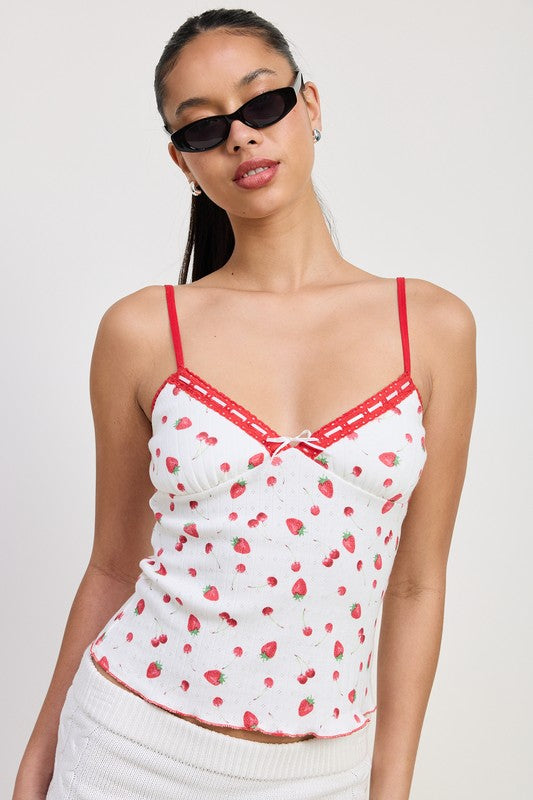 Emory Park Printed Jersey Cami Top with red strawberry print and red trim on model