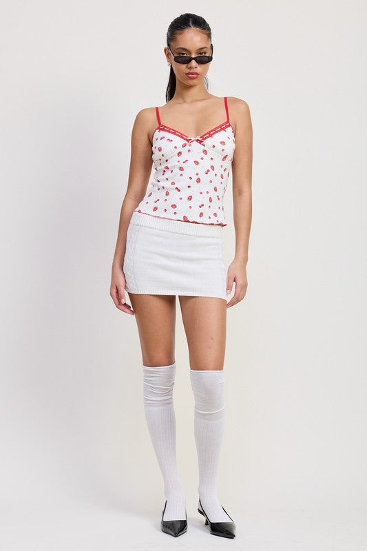 Emory Park Printed Jersey Cami Top with red and white floral pattern worn with white mini skirt and knee-high socks