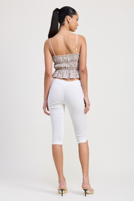 Emory Park Floral Tiered Ruffle Top with spaghetti straps worn by model from back view