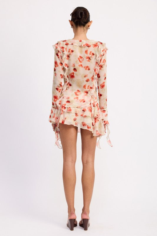 Back view of Emory Park Ruffle Trim Sheer Peplum Top with floral pattern and long sleeves