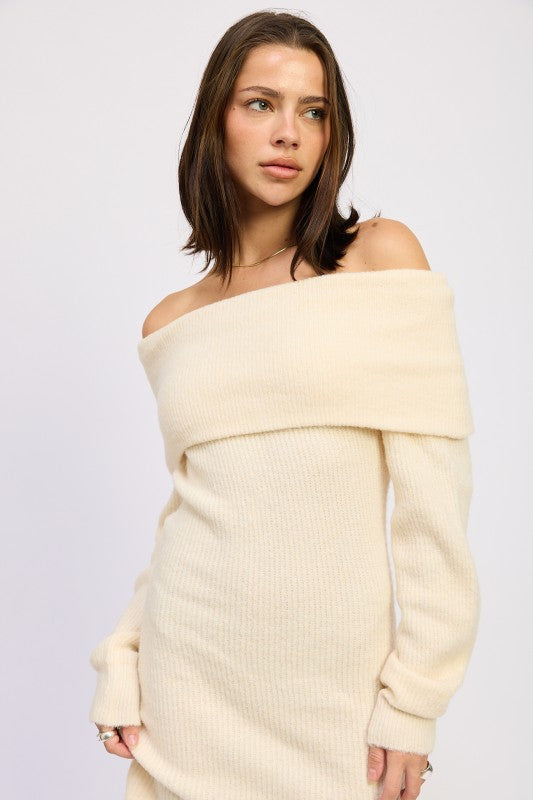 Emory Park model wearing Long Sleeve Off-Shoulder Mini Knit Dress in cream ribbed knit with fitted silhouette
