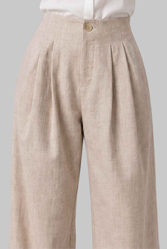 Virtual model wearing The Cannes Pleated Trouser High Waisted Wide Leg Pants in Beige