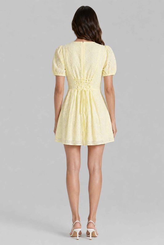 Virtual model wearing The Capri Eyelet Mini Yellow Cotton Puff Sleeve Mini Dress