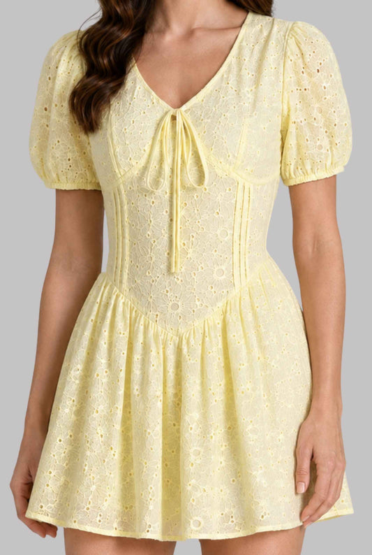 Virtual model wearing The Capri Eyelet Mini Yellow Cotton Puff Sleeve Mini Dress