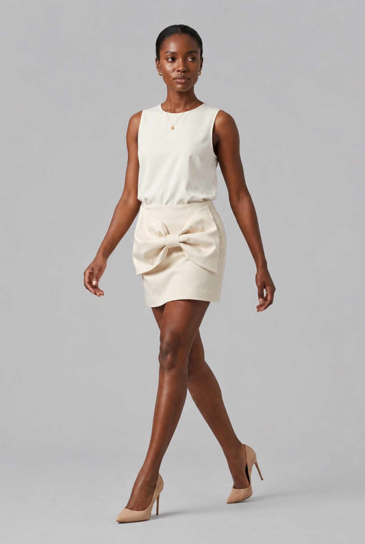 Virtual Model wearing The Cordelia Bow Skirt Taffeta Cream Mini Skirt