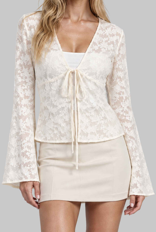 Virtual model wearing The Flora Front-Tie Cardigan Devoré-Lace Floral Tied Cardigan in Cream