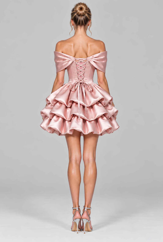 Virtual model wearing The Rosabelle Bow Tiered Dress Satin Tie-Up Corset Mini Ball Gown in Blush