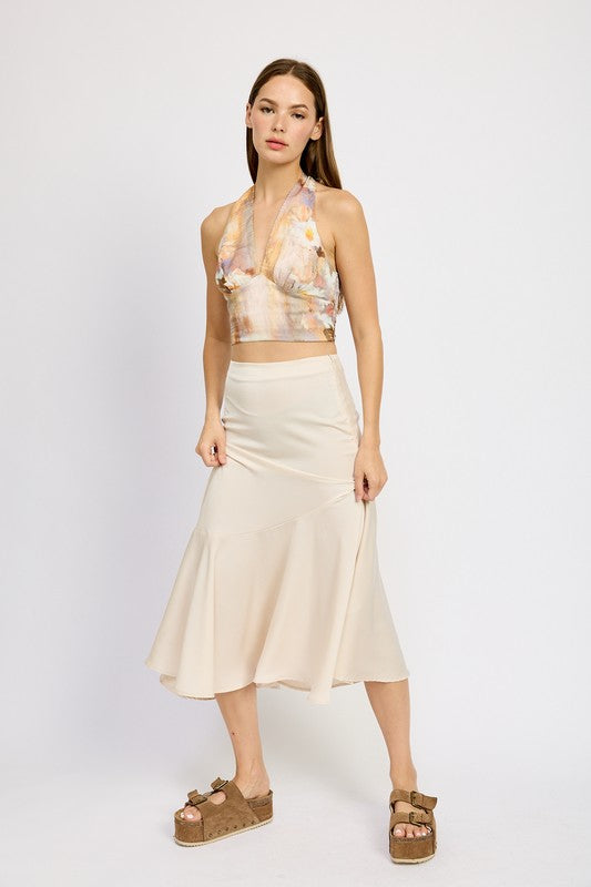 Emory Park asymmetrical ruffle hem skirt in Taupe worn by model with printed halter top