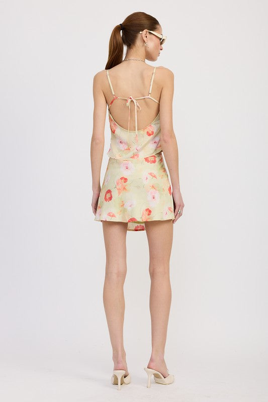 Emory Park Bias Cut Mini Satin Skirt in floral pattern worn by model with open back top