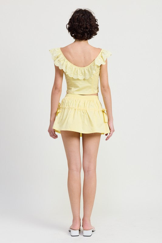 Emory Park Mini Ruched Poplin Mini Skirt in soft yellow with side ties and ruched detailing
