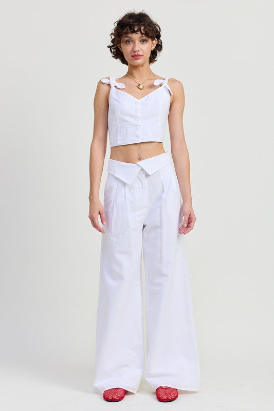 Emory Park white Button Up Cropped Top With Shoulder Ties paired with wide-leg white pants