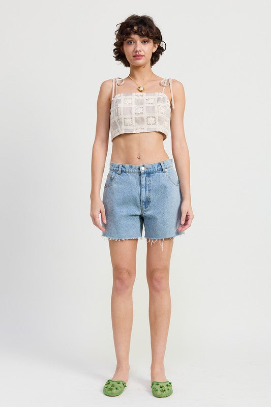Emory Park cropped crochet top in beige worn with high-waisted denim shorts and green flats