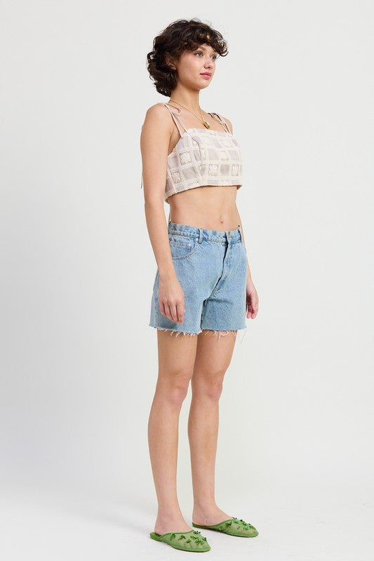 Emory Park beige cropped crochet top worn with light denim shorts and green flats