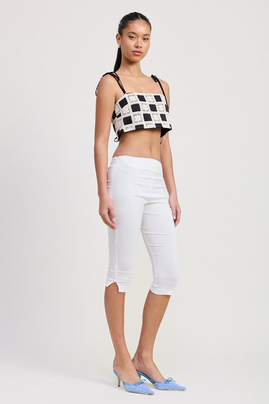 Emory Park black and white Cropped Crochet Top worn with white capri pants and blue heels