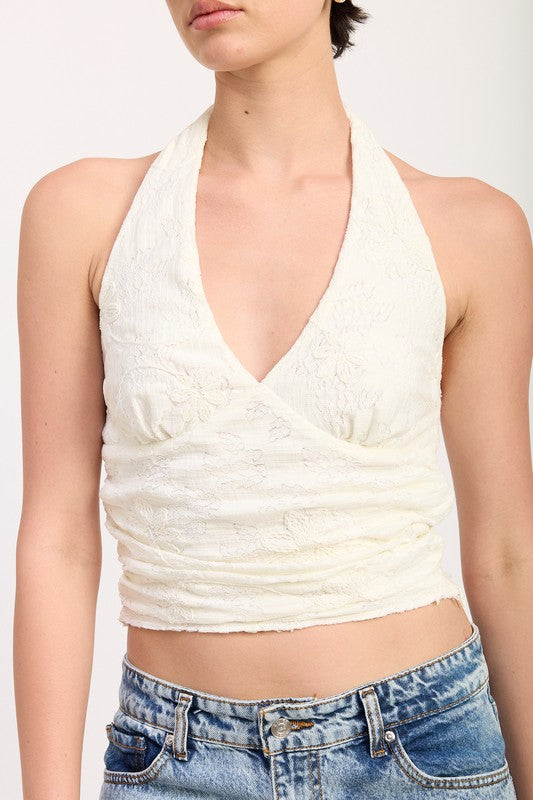 Emory Park white Cropped Halter Top With Lace Detail paired with blue denim jeans