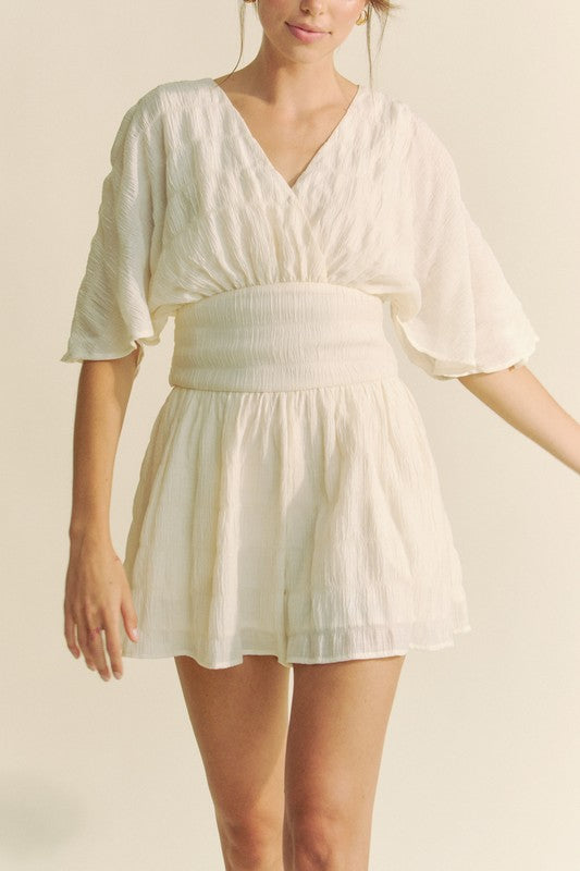 Davi & Dani Batwing Sleeve Waist Belt Romper in Cream for a Stylish Summer Outfit