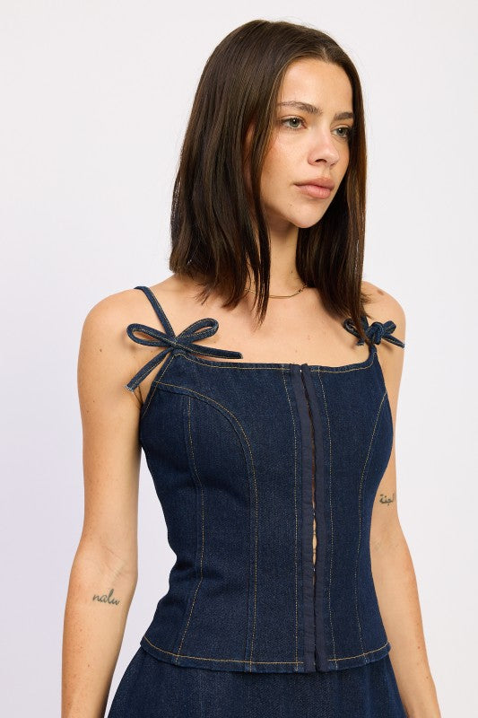 Emory Park Denim Bustier Top With Zipper featuring adjustable tie straps and a fitted silhouette.
