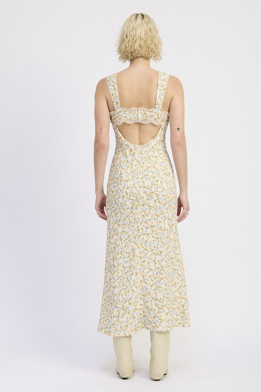 Back view of Emory Park Ditsy Print Midi Dress With Cutout and Lace Trim in light floral pattern