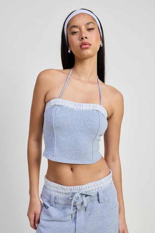Woman wearing Emory Park double waist straight leg pants with a drawstring and matching top