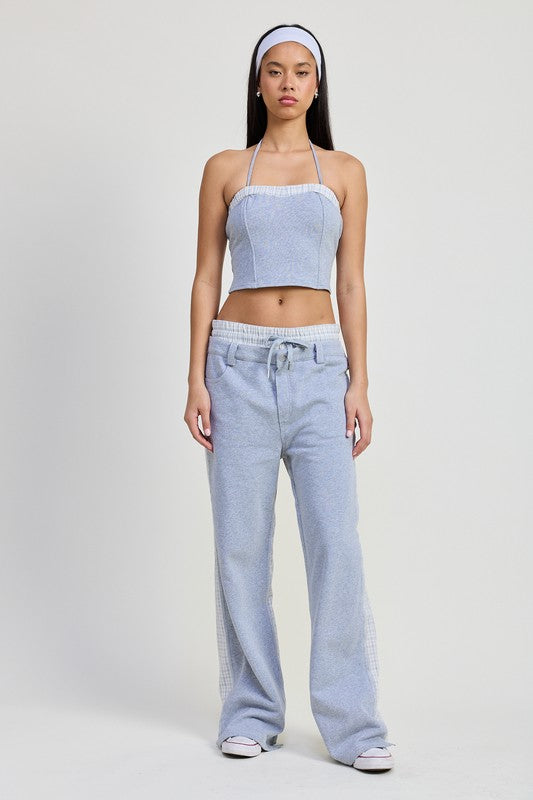 Emory Park Double Waist Straight Leg Pants in light blue worn with matching halter top and headband