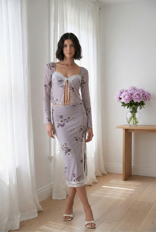 Floral Midi Lavender Skirt With Lace Trim paired with a matching top in a light room setting