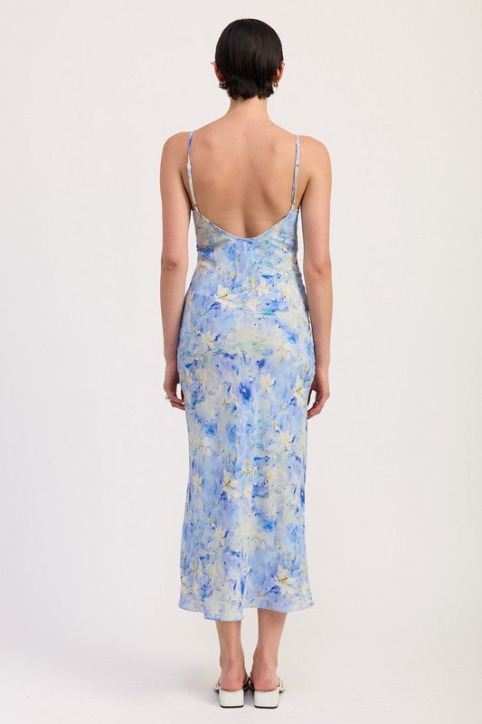 Back view of Floral Satin Slip Midi Dress by Emory Park in blue and yellow floral print with thin straps