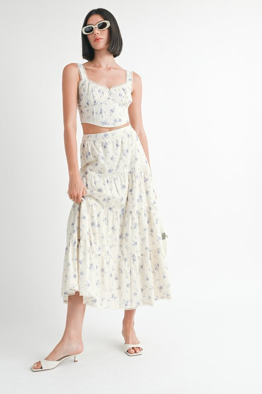 Emory Park Floral Squared Neck Top in white with blue floral print worn with matching skirt and sunglasses