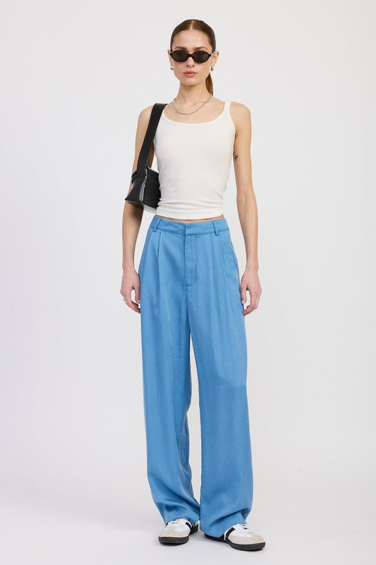 Emory Park high waist wide leg trousers with front pleats in blue worn with white tank top and sunglasses
