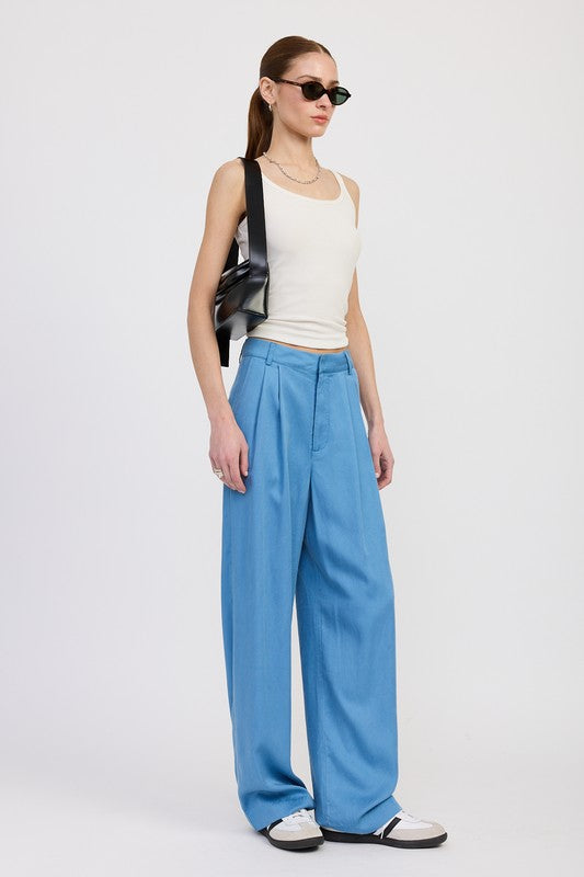 Emory Park High Waist Wide Leg Trousers With Front Pleats in blue styled with tank top and sunglasses