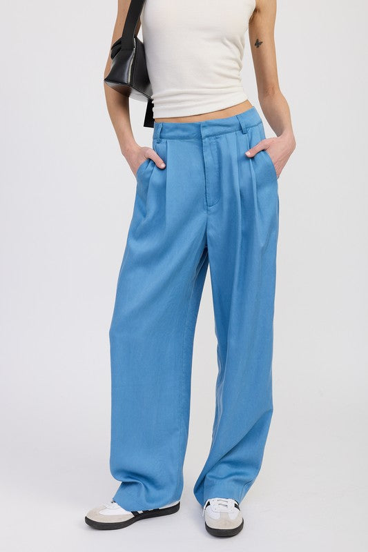 Emory Park High Waist Wide Leg Trousers With Front Pleats in blue styled with white tank and sneakers