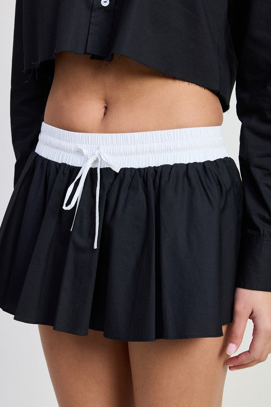 Emory Park Mini Contrast Waistband Skirt in black with white waistband and drawstring detail close up