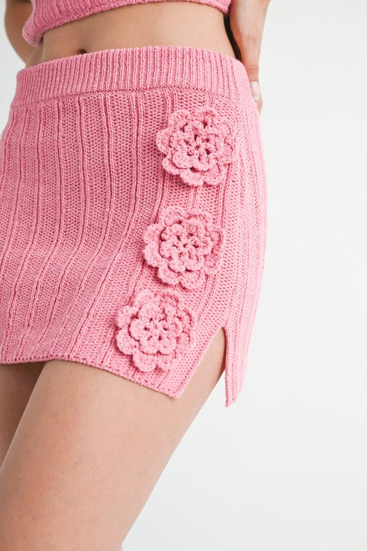 Emory Park pink mini crochet skirt with floral applique and side slit detail