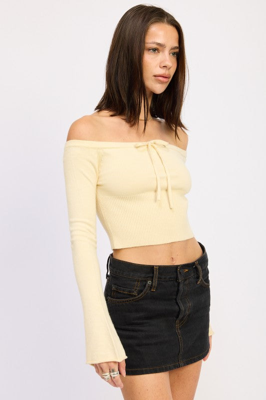 Emory Park Off-Shoulder Cropped Top in pale yellow ribbed knit with tie front and bell sleeves on model