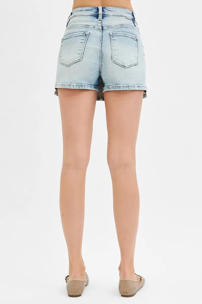 RISEN High Rise Button Down Skorts in light wash denim with a stylish button front and back pockets
