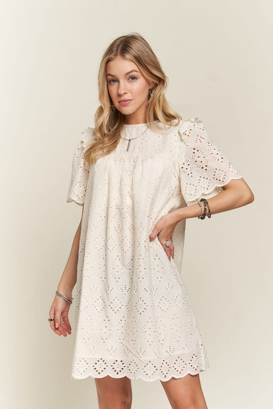 Ruffled Eyelet Dress in Cream with Puff Sleeves and Scalloped Hem for Summer Fashion