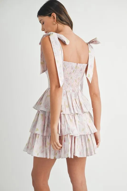 Shoulder tie mini dress in floral print with smocked bodice and tiered skirt