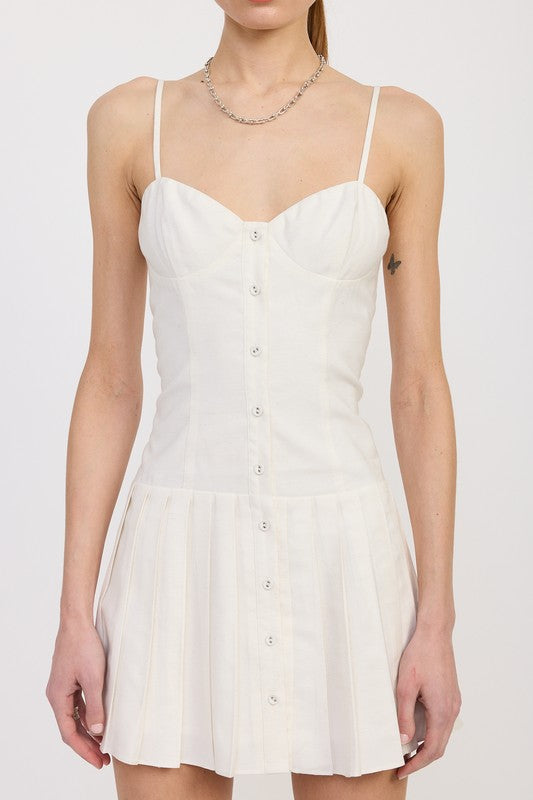 Emory Park Spaghetti Strap Pleated Mini Dress in white with button front and fitted bodice close up