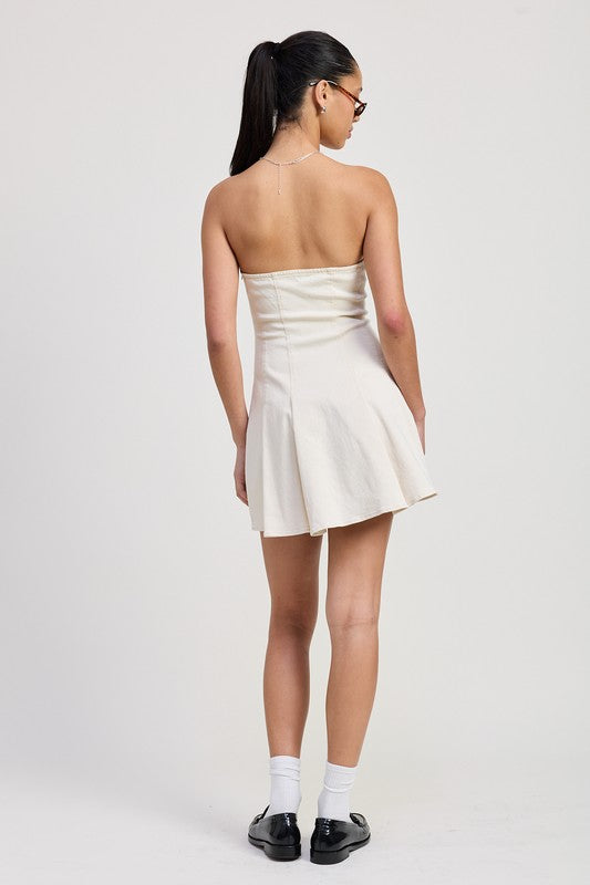 Emory Park Strapless Mini Ruffle Dress in white worn by model with ponytail and sunglasses