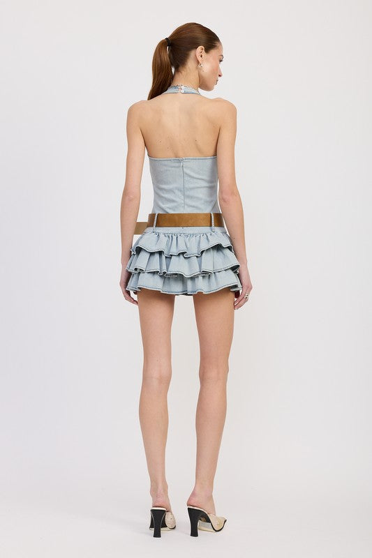 Emory Park tiered mini dress with halter neck and belt in light blue denim style worn by model from back