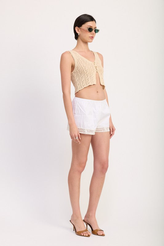 Emory Park Crochet Button Front Vest Top in beige worn with white shorts and brown heels