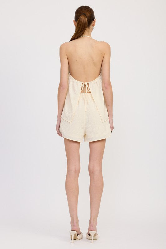 Emory Park Halter Neck Top with Back Tie in cream color worn with matching shorts