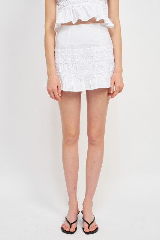 Emory Park High Waist Gathered Mini Skirt in white with ruched detailing and ruffled hem