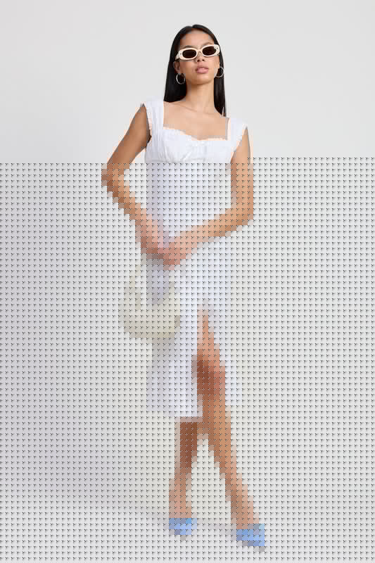 Emory Park Square Neck Midi Cap Sleeve Dress in white with front slit and ruffle hem worn with white handbag and sunglasses