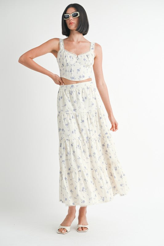 Emory Park Floral Tiered Maxi Skirt in white with light purple floral print worn with matching crop top