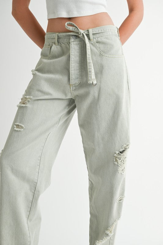 Emory Park Distressed Wide Leg Pants in light gray with belt and ripped details